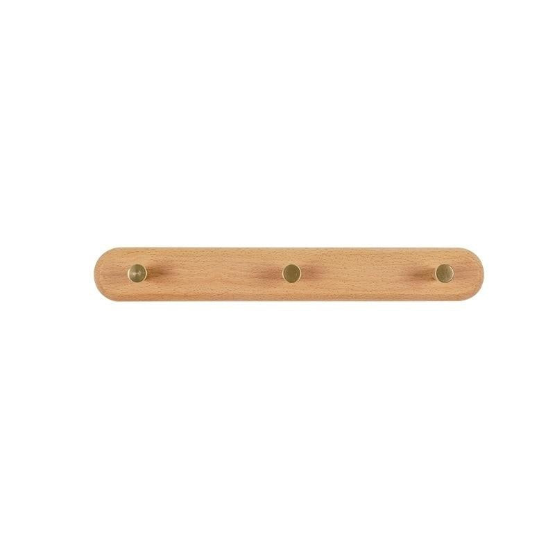 Brunn – Garderobenleiste aus Holz & Messing
