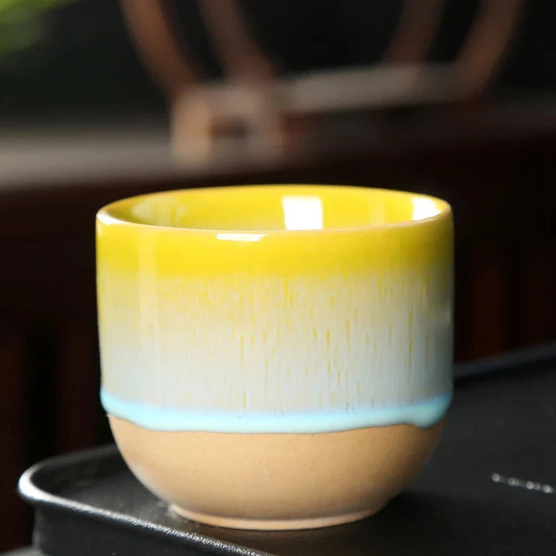 Keramiktasse mit bunter Tropfenglasur