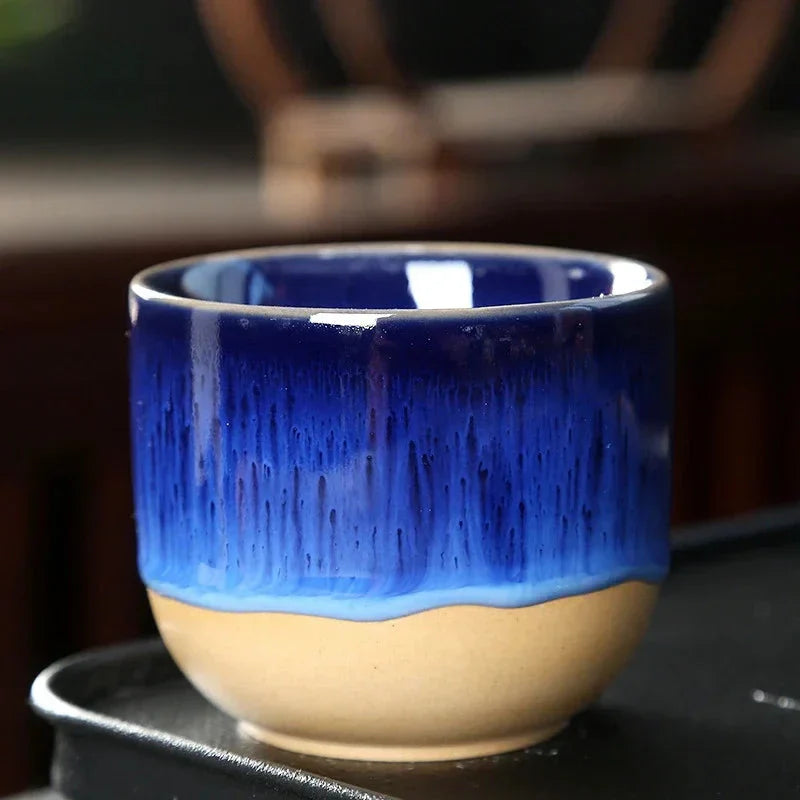 Keramiktasse mit bunter Tropfenglasur