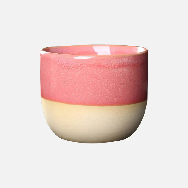 Keramiktasse mit bunter Tropfenglasur