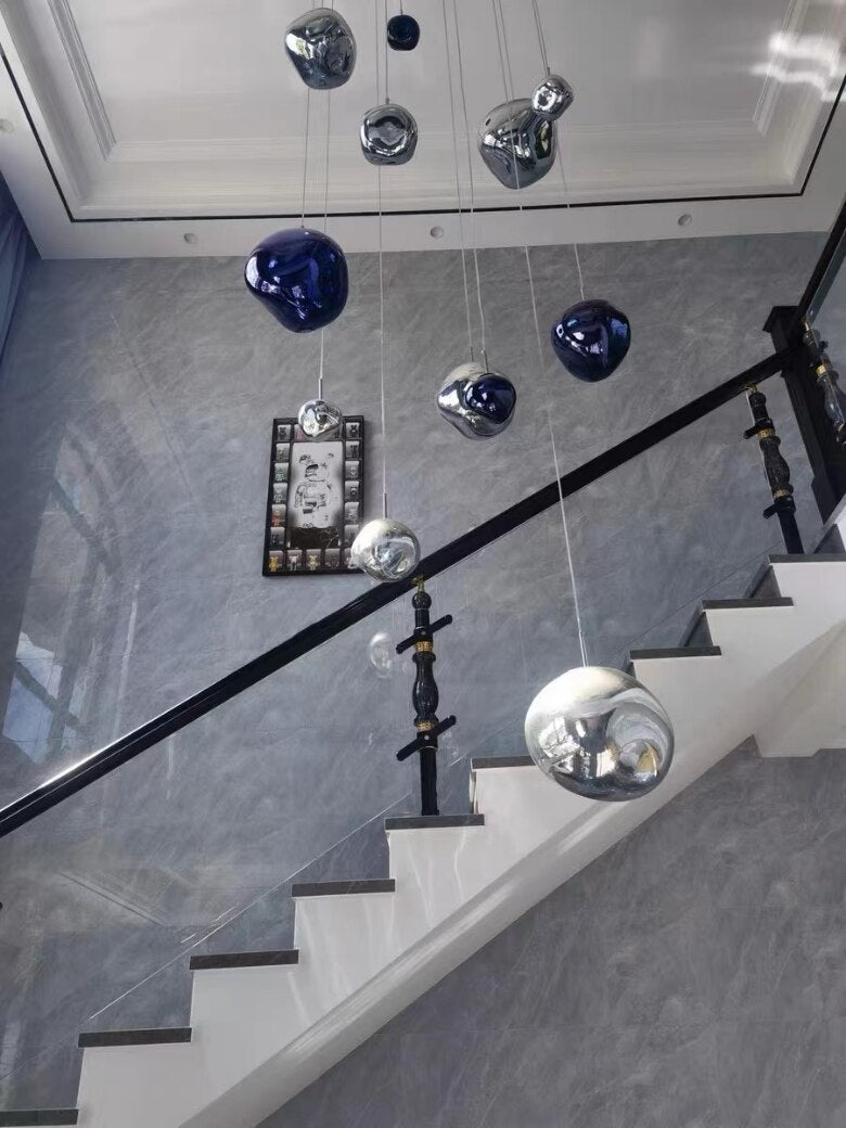 LavaGlow - LED-Pendelleuchte aus mundgeblasenem Lavaglas