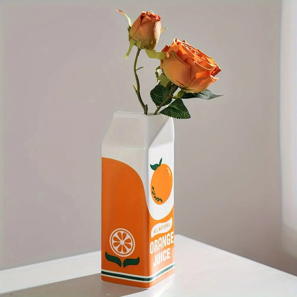 CitrusVase – Verspielte Vase im Orangensaftkarton-Design