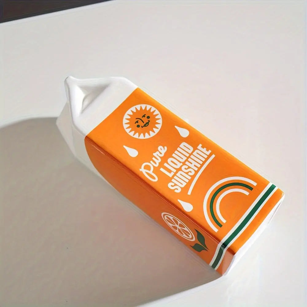 CitrusVase – Verspielte Vase im Orangensaftkarton-Design