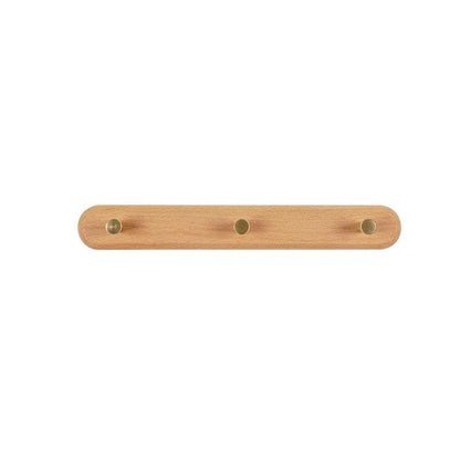 Brunn – Garderobenleiste aus Holz & Messing