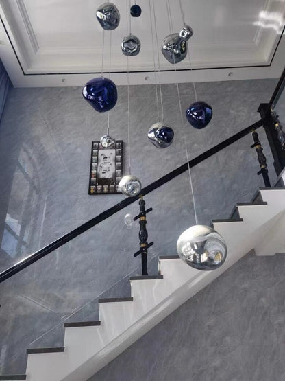 LavaGlow - LED-Pendelleuchte aus mundgeblasenem Lavaglas