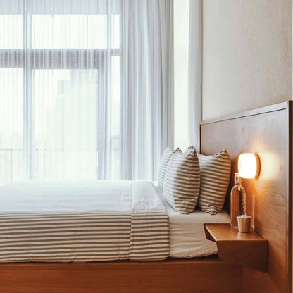 Vera – Skandinavische Wandlampe im Wellen-Design