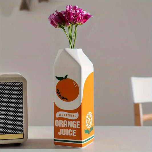 CitrusVase – Verspielte Vase im Orangensaftkarton-Design