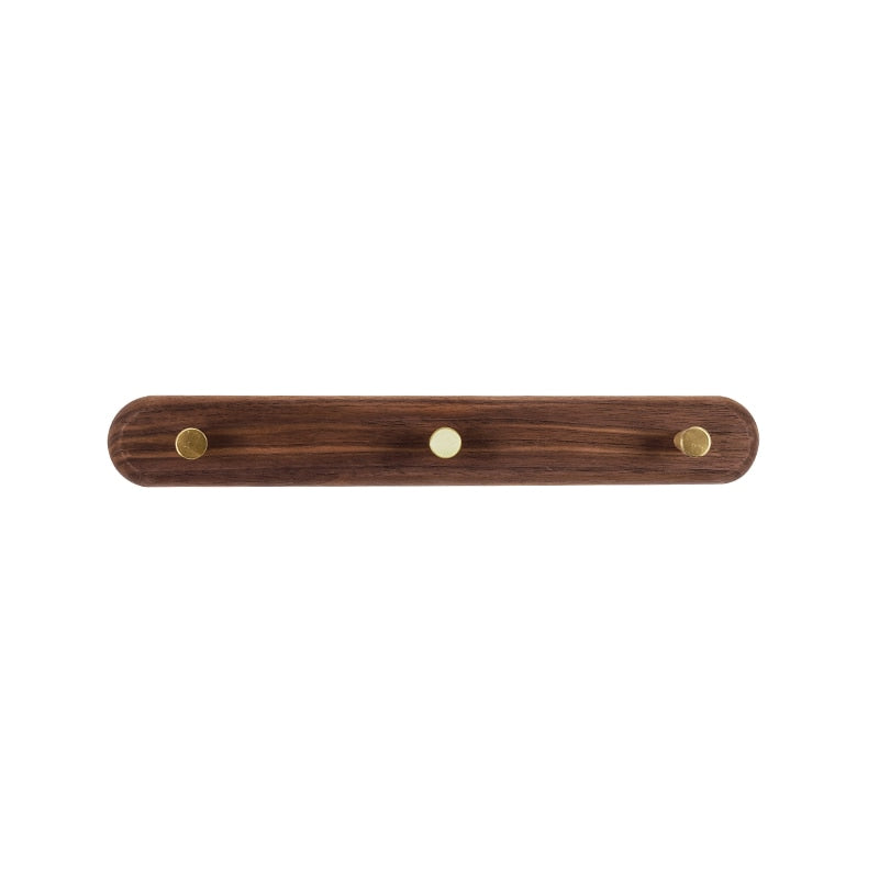 Brunn – Garderobenleiste aus Holz & Messing